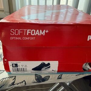 Women’s PUMA Black and White Sneakers